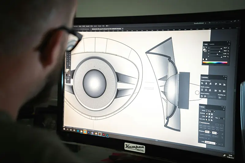 A designer working on a 3D product rendering displayed on a computer screen. A product liability lawyer may handle product liability lawsuits related to design defect claims. Proper engineering and quality control are crucial to preventing potential legal issues arising from defective product designs.